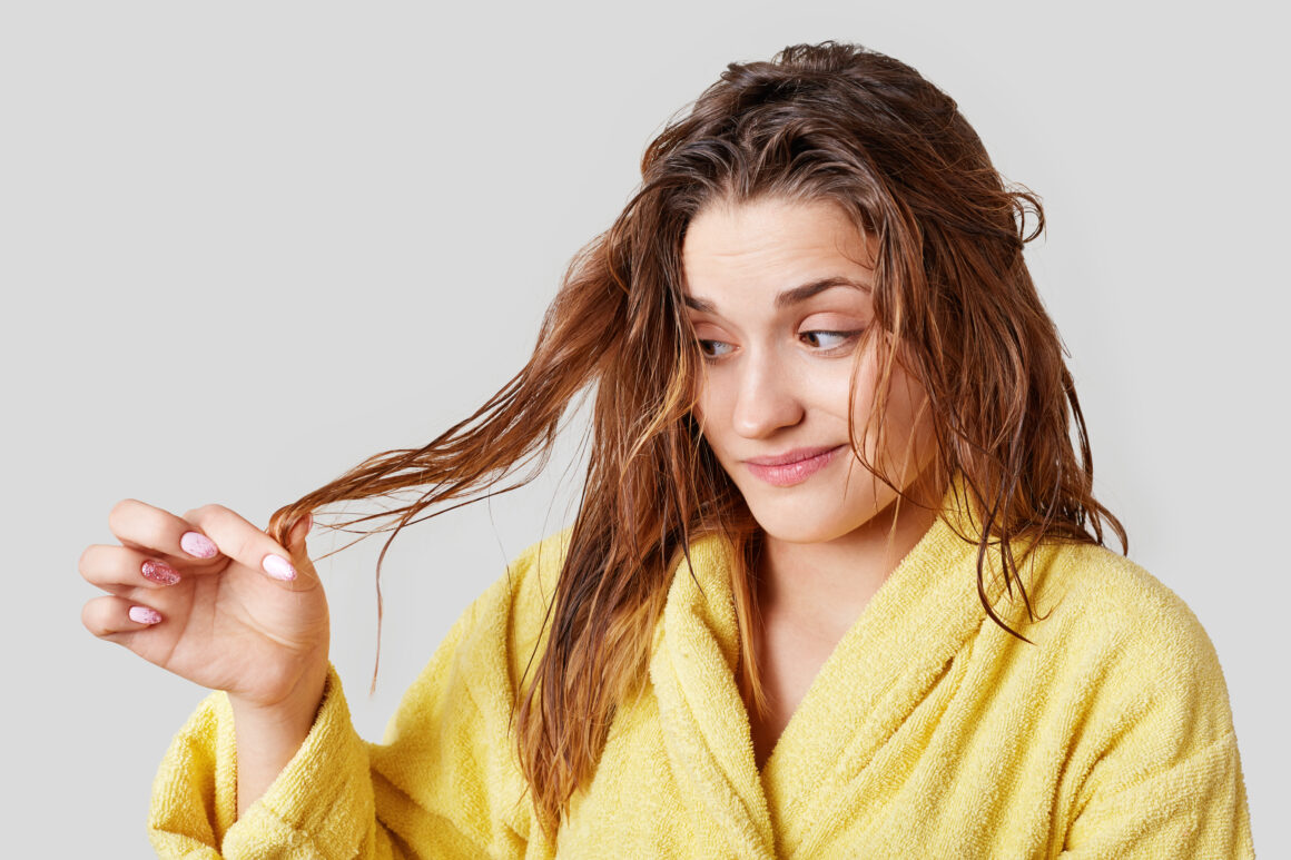 Beautiful Woman Wondering About How To Style Coarse Hair