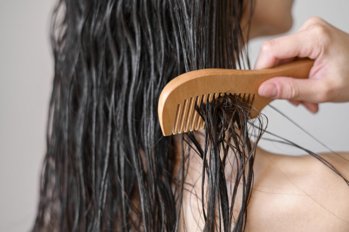 Woman showcasing her luscious, coarse hair.