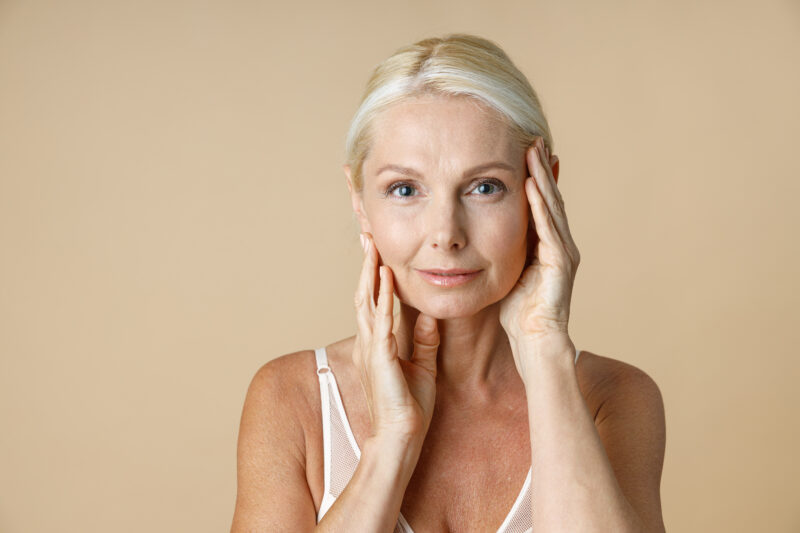 women showing her skin after anti-aging treatments