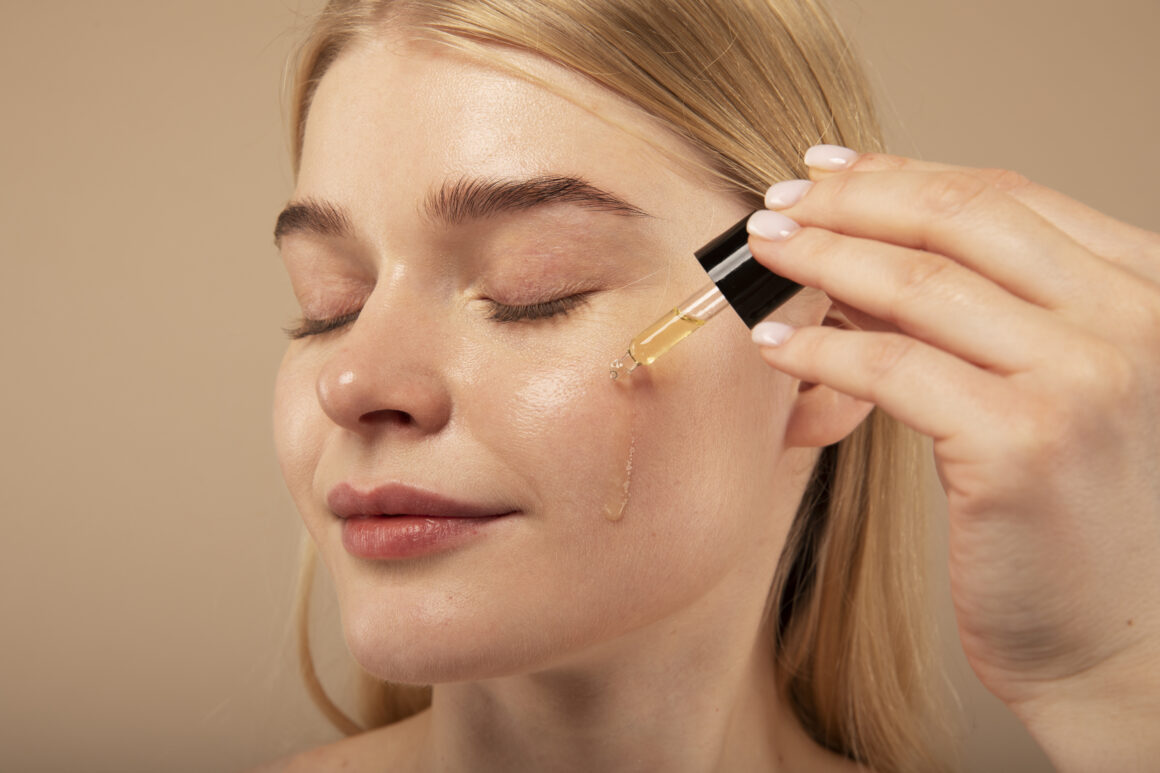 Women applying a Skincare Serum on her face