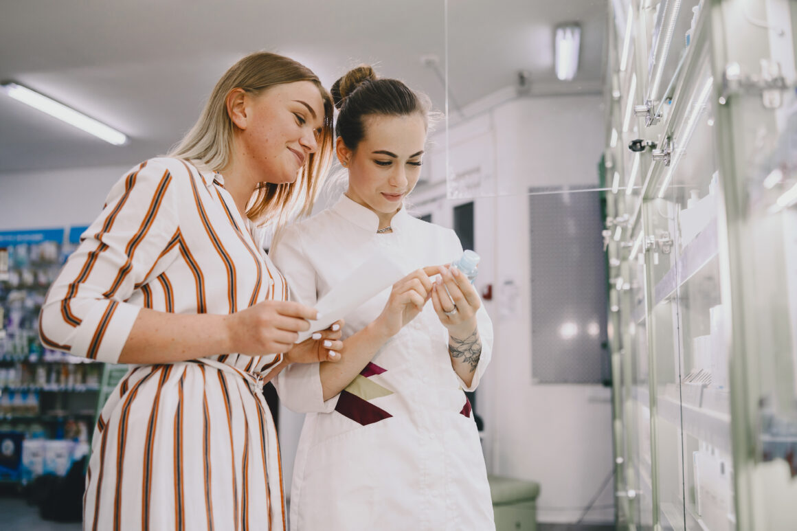 Women reading product label for the Right Skincare Ingredients that matches their Skin Type