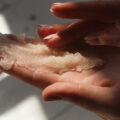 a Hand with DIY Body Scrub