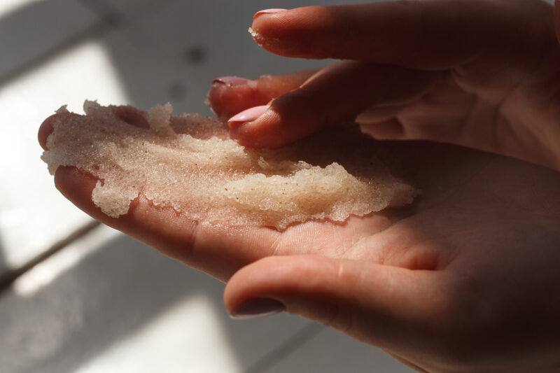 a Hand with DIY Body Scrub