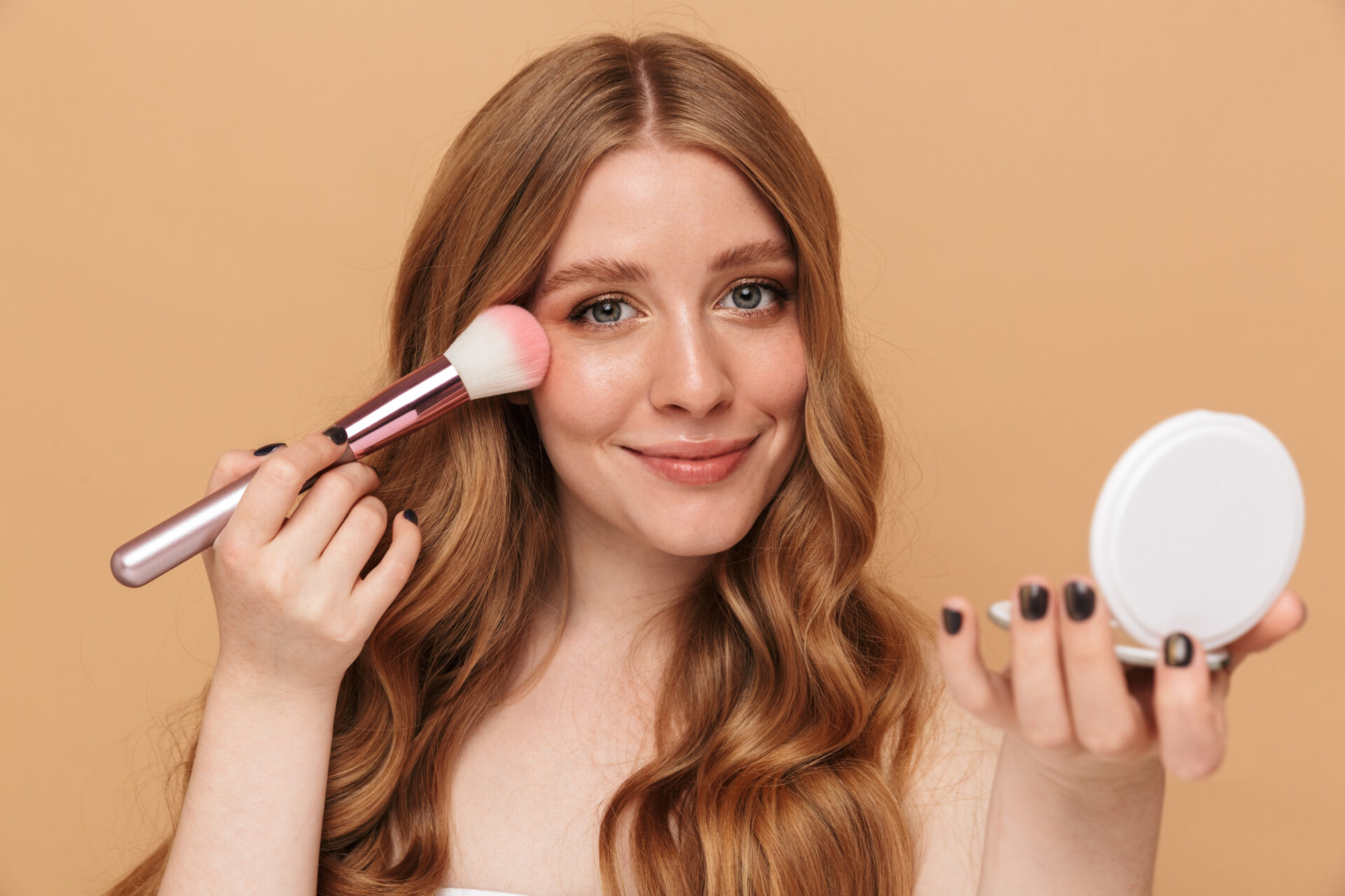 A beautiful Woman Showing How to Do the Natural Makeup Look