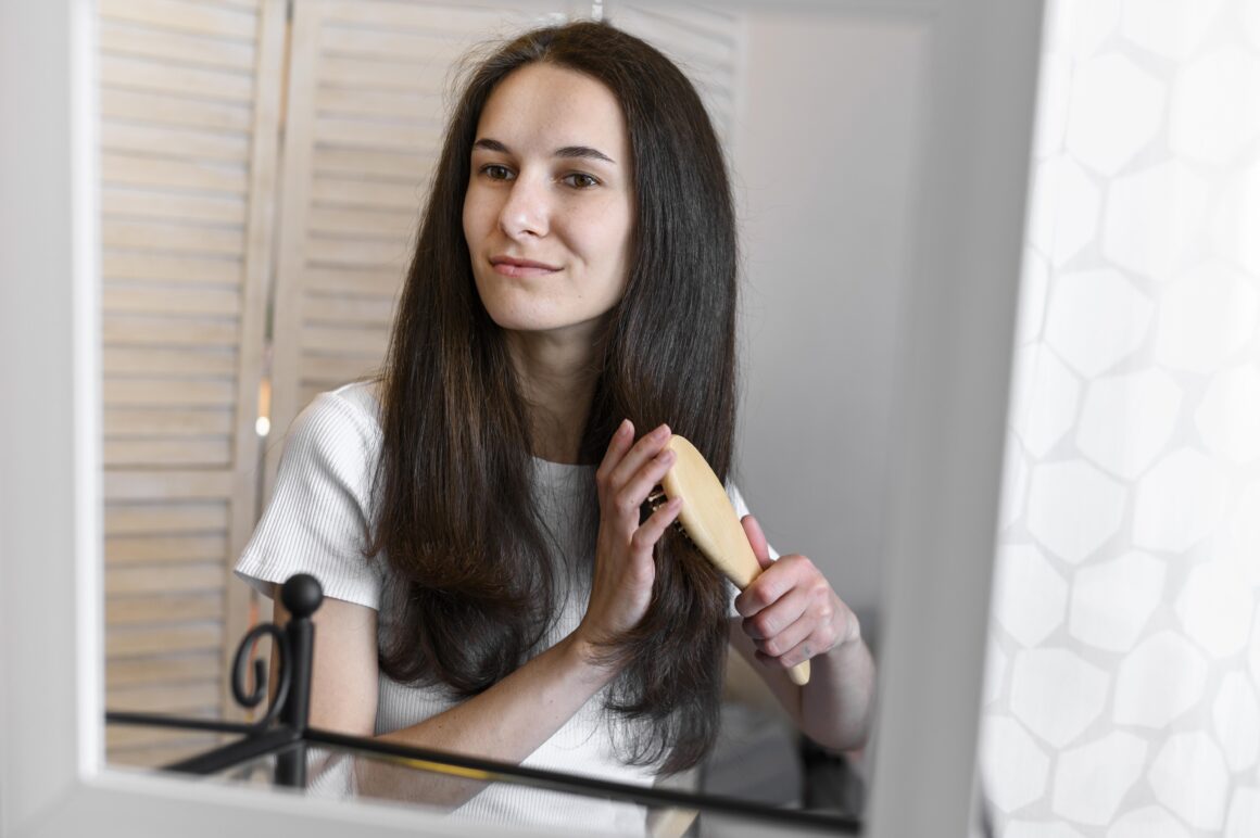 Woman showcasing her luscious, coarse hair.